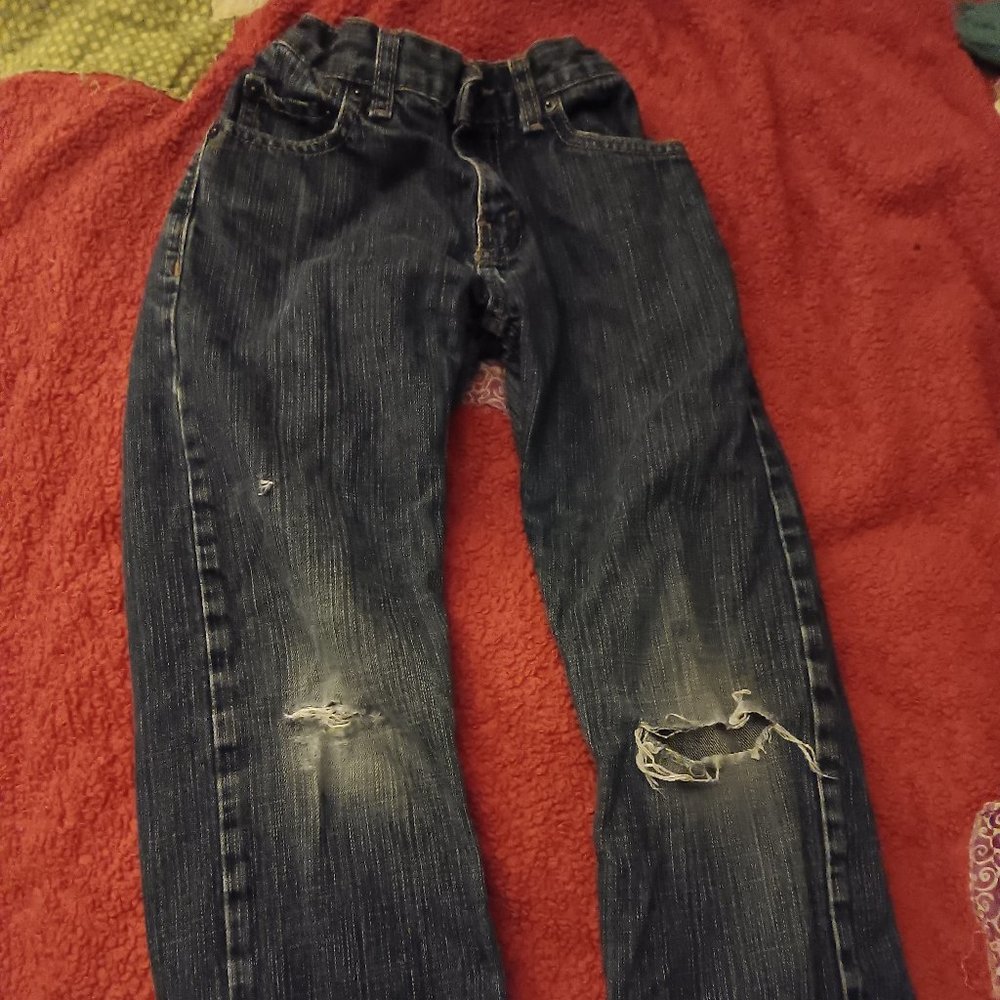 Kids size 6 small boys/girls jeans with holes